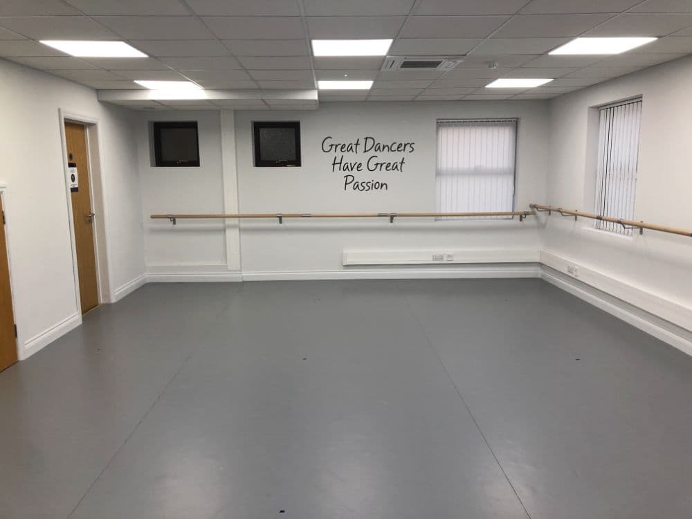 Empty LESTA studio with sprung floor and ballet barre, Knaphill
